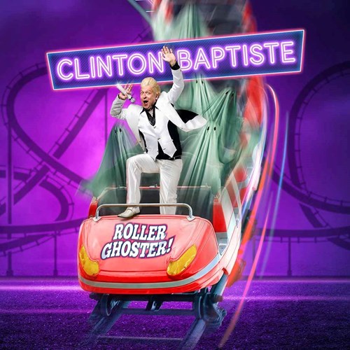 Clinton Baptise stands in a roller coaster cart with several ghosts in white sheets behind him. 