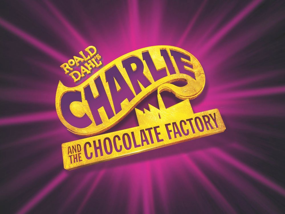Bright and colourful logo for Roald Dahl's Charlie and the Chocolate Factory. The title is in bold, stylised yellow and purple text with a golden ticket design, set against a vivid purple starburst background on black.