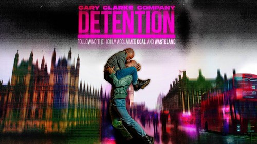 Promotional artwork for 'Detention' by Gary Clarke Company. The image features two bald male performers in an intense, physical embrace—one lifting the other in the air while they press their faces together. The background is a distorted, glitch-like depiction of London, with a blurred image of the Houses of Parliament, Big Ben, and a red double-decker bus. The title 'Detention' appears in large, bold, pink text.