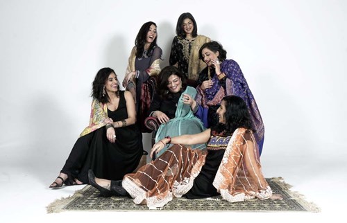 Group of women of South Asian heritage laughing together