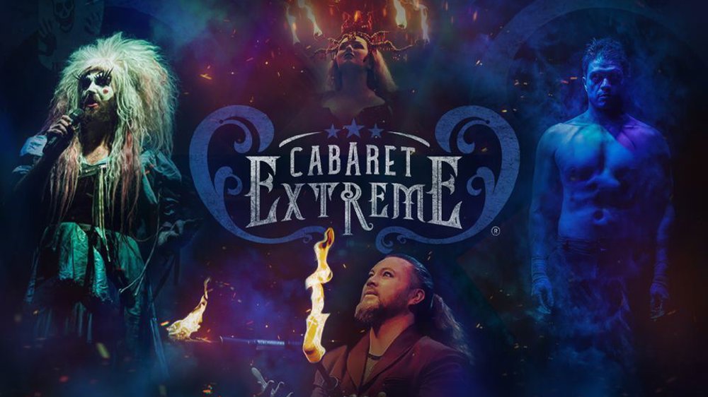 Promotional poster for ‘Cabaret Extreme’ featuring dramatic, theatrical performers. On the left, a performer in wild makeup and a tattered green dress sings into a microphone. At the top centre, a woman wears a flaming candelabra on her head. Below her, a man breathes fire. On the right, a shirtless male performer stands in blue light. The show’s title ‘Cabaret Extreme’ appears in ornate lettering at the centre.